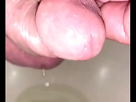 Freshly shaved cock peeing